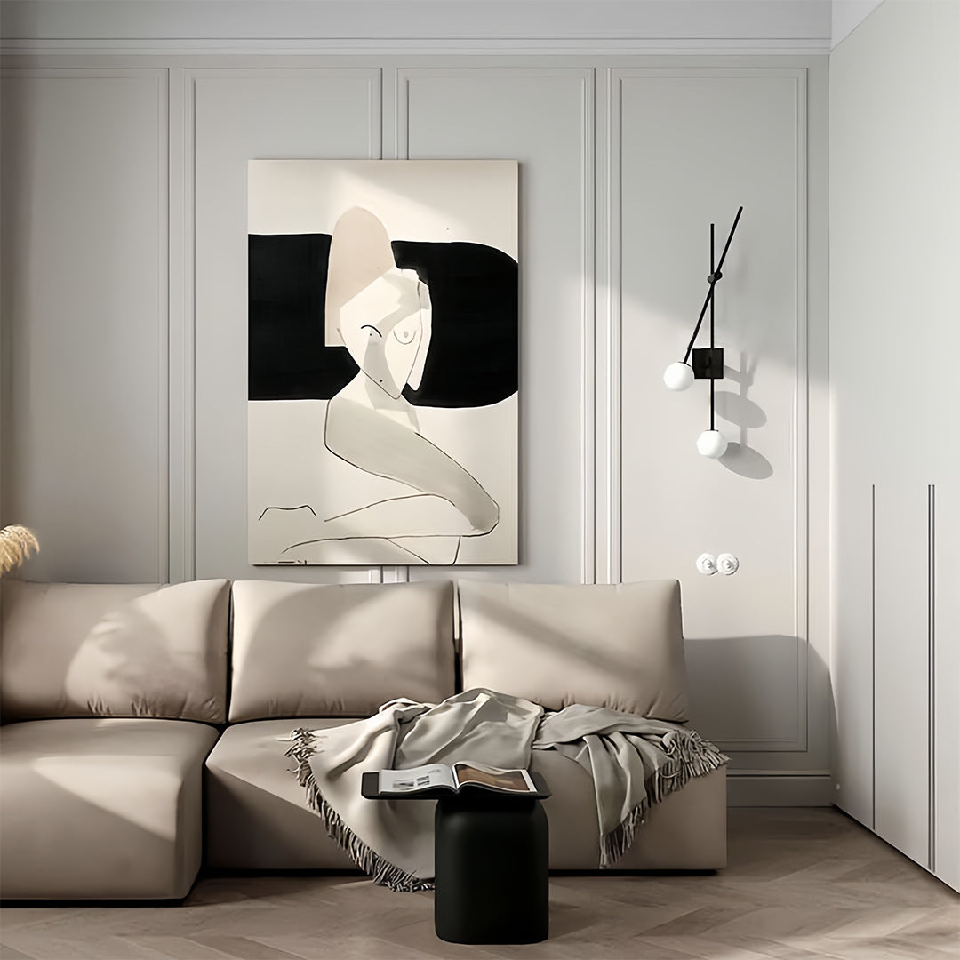 Minimalist black linear wall light with spherical bulbs in a contemporary living room