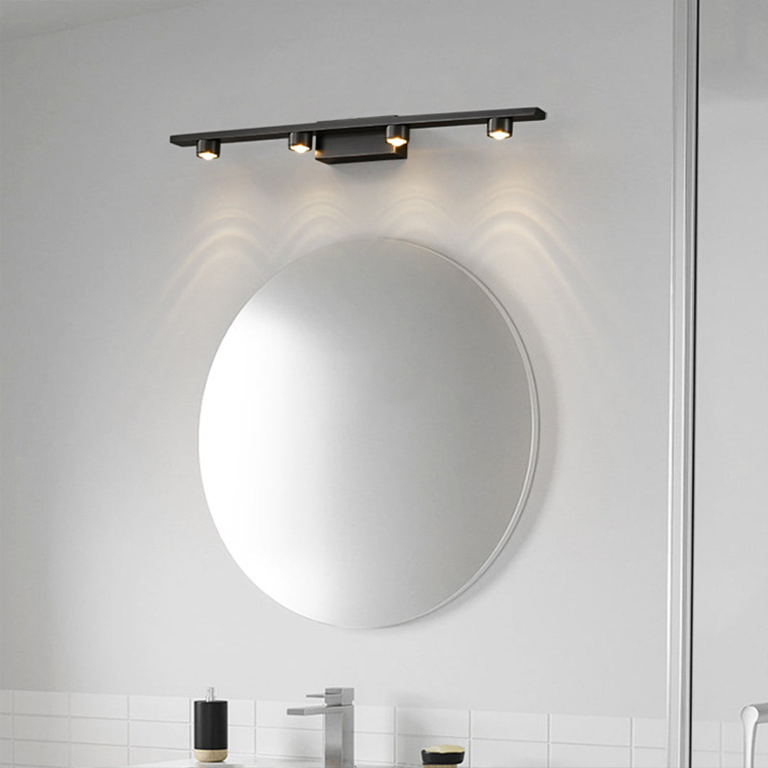 Minimalist black vanity lights for bathroom above round mirror in clean modern powder room design