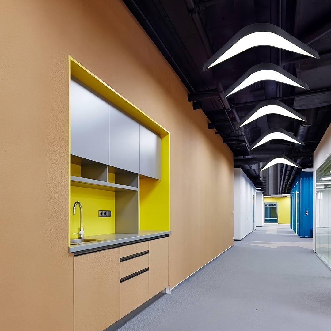 Minimalist black wrought iron chandelier with a curved silhouette, ideal for sleek and stylish interiors.