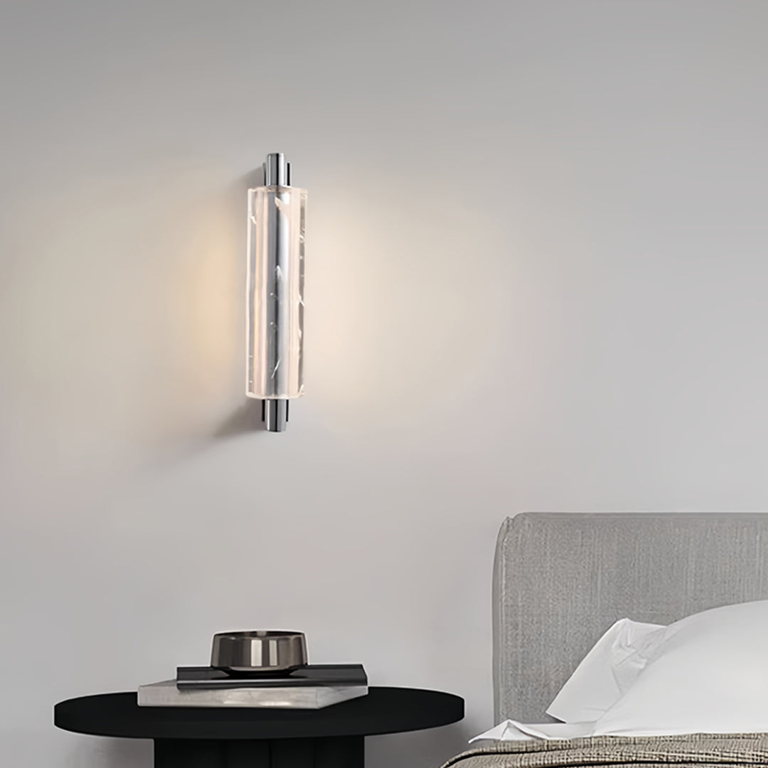 Minimalist crystal pendant light featuring single crystal rod with warm LED glow perfect for modern bedroom applications