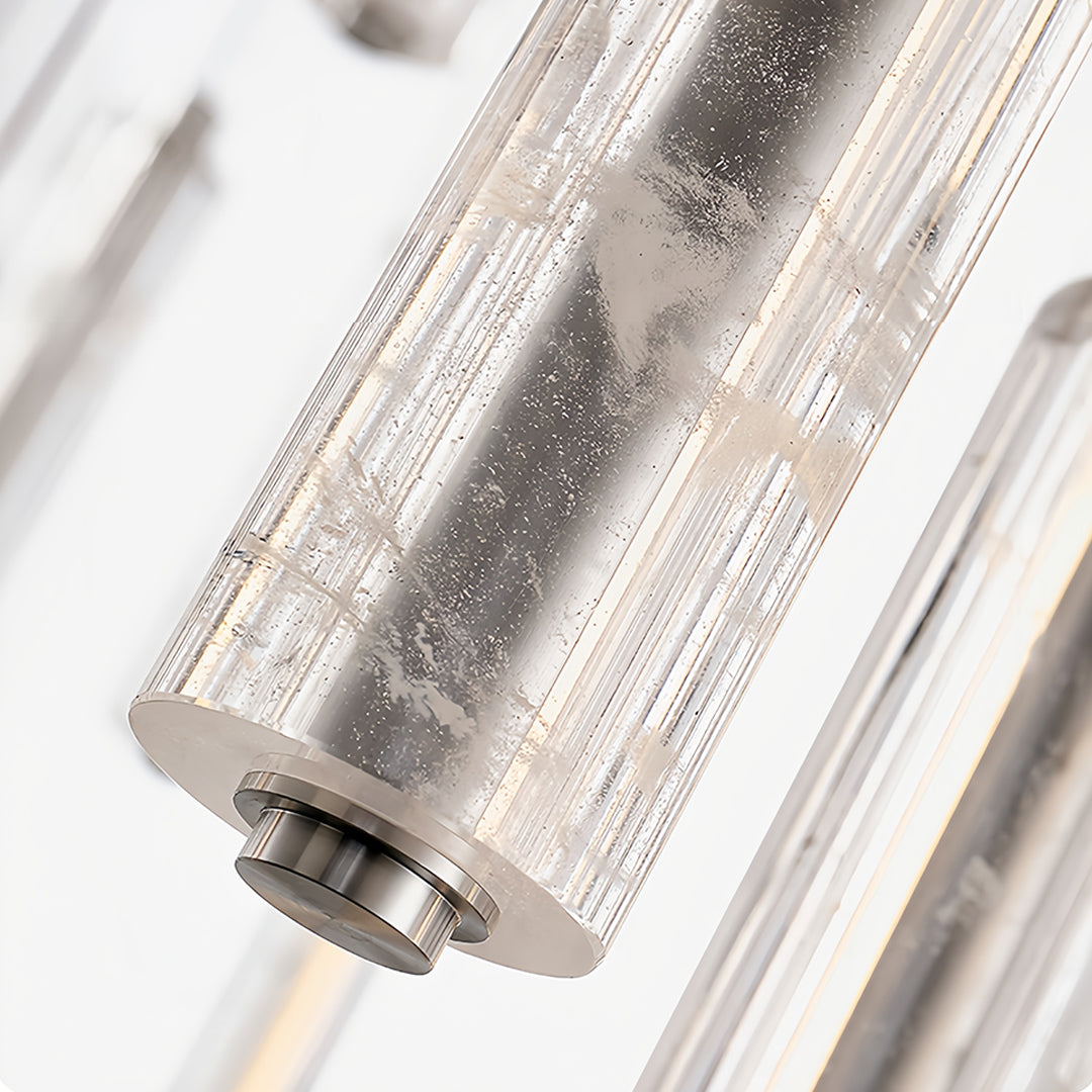 Minimalist crystal pendant light featuring single crystal rod with warm LED glow perfect for modern bedroom applications