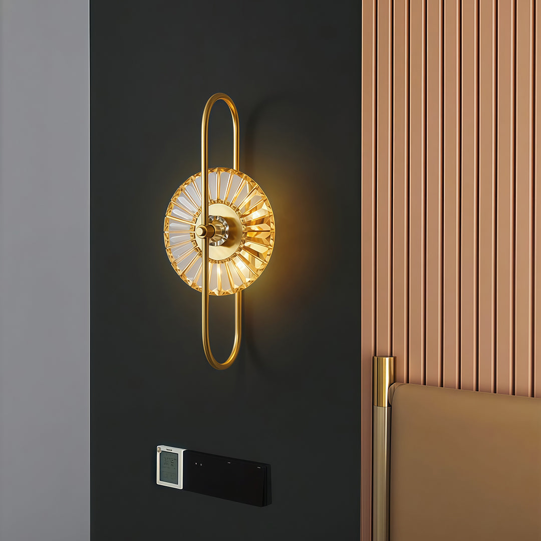 Minimalist crystal wall sconces lighting featuring glass shade chandelier design providing soft illumination on textured wall panel.