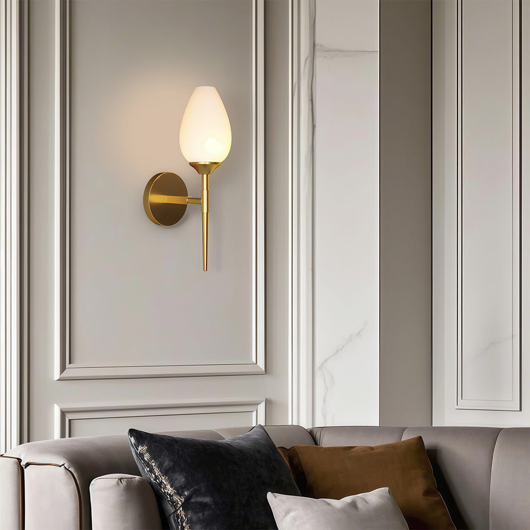 Minimalist glass wall lights featuring glass shade chandelier design providing soft illumination in elegant traditional dining room.