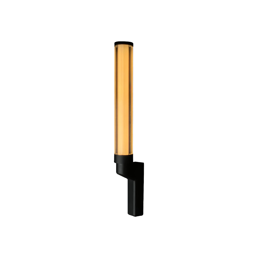 Minimalist vertical gold wall sconce with black mount, representing a sleek outdoor sconces modern design.