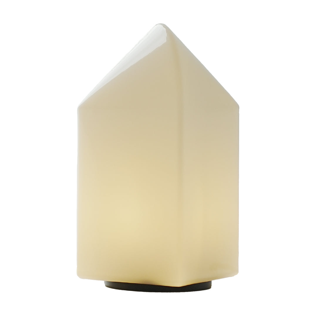 Minimalist house-style bedside lamp in matte white finish.