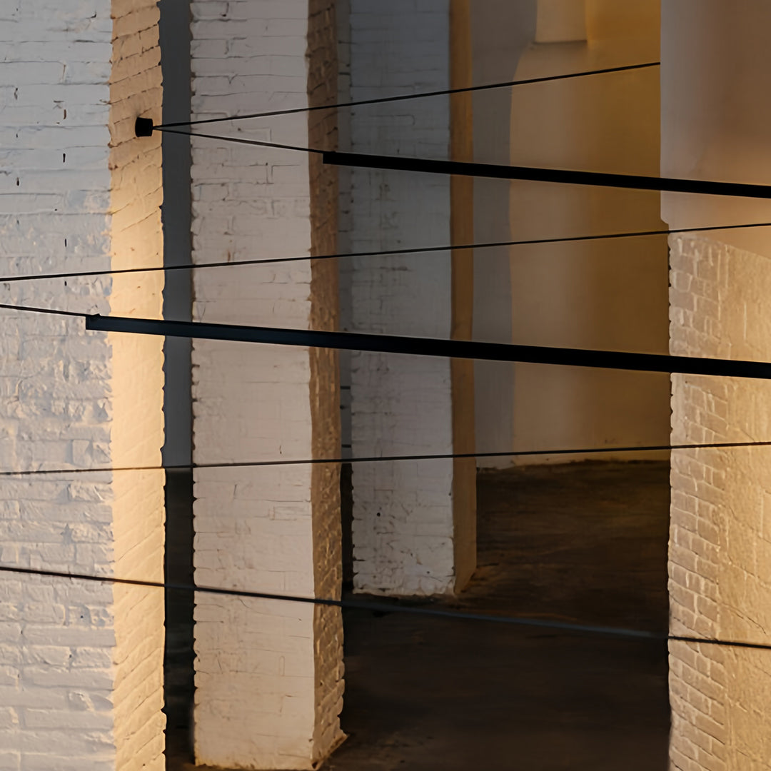 Minimalist interior with long pendant light fixtures, elegant linear lighting for modern spaces