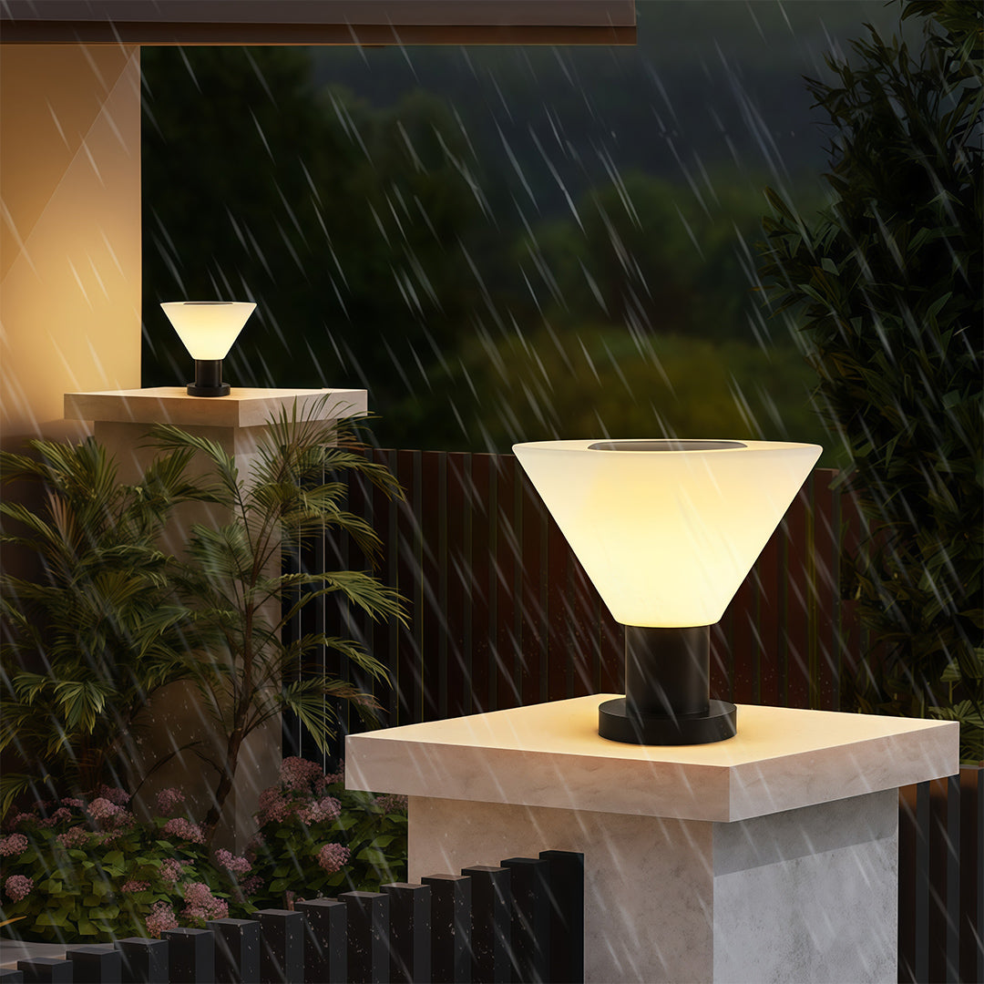 Minimalist landscape pillar lighting featuring glass shade chandelier design providing ambient lighting on modern pillar structure.