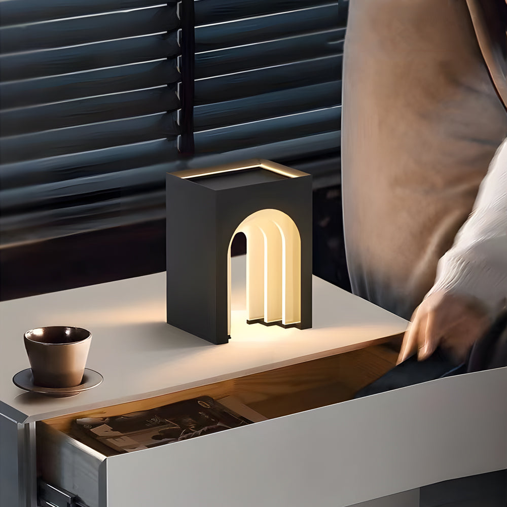 Minimalist lighted lawn decorations with clean lines and warm LED accents creating sophisticated outdoor architectural lighting