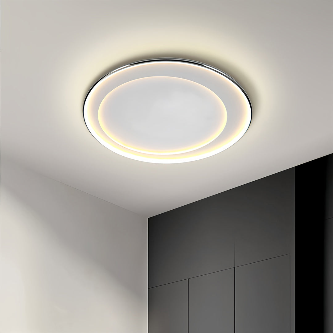 LED round flush mount light installed in minimalist room providing clean ceiling lighting solution