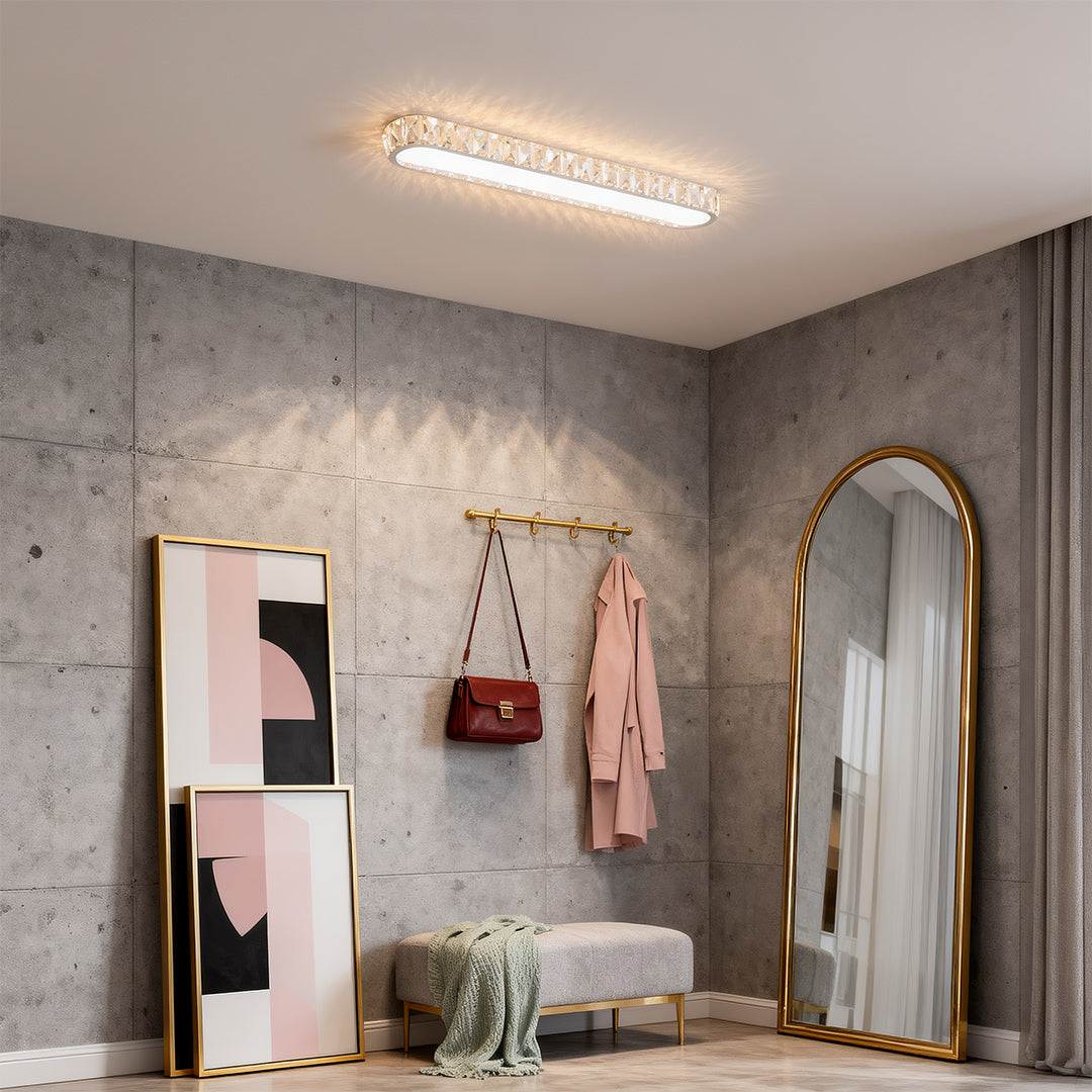 Minimalist LED flush mount light fixture with glass shade chandelier design illuminating sleek gray concrete bedroom space.