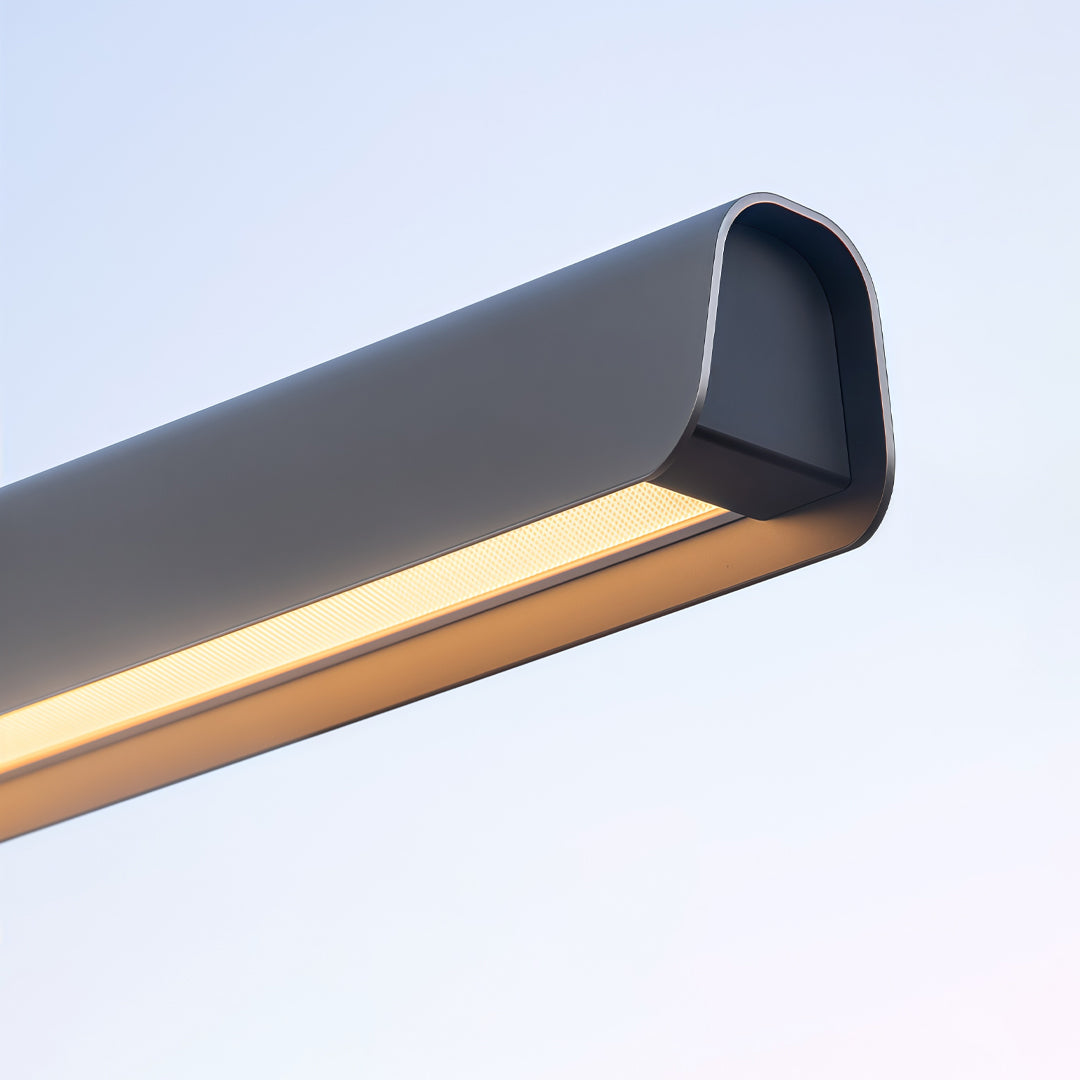 Minimalist LED linear suspension light featuring slim integrated warm LED illumination.