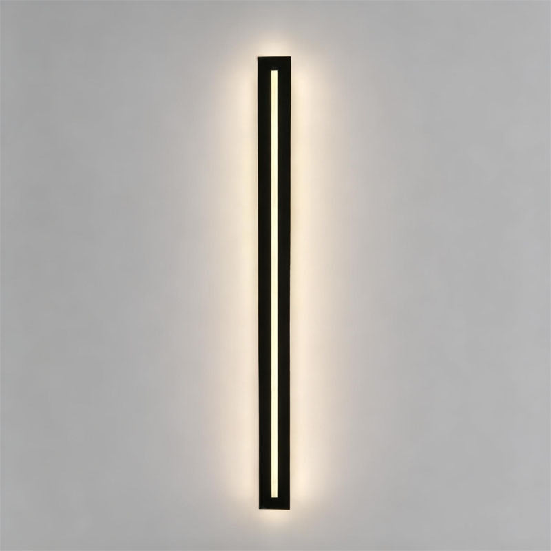Front view of minimalist long black wall sconces with warm LED glow.