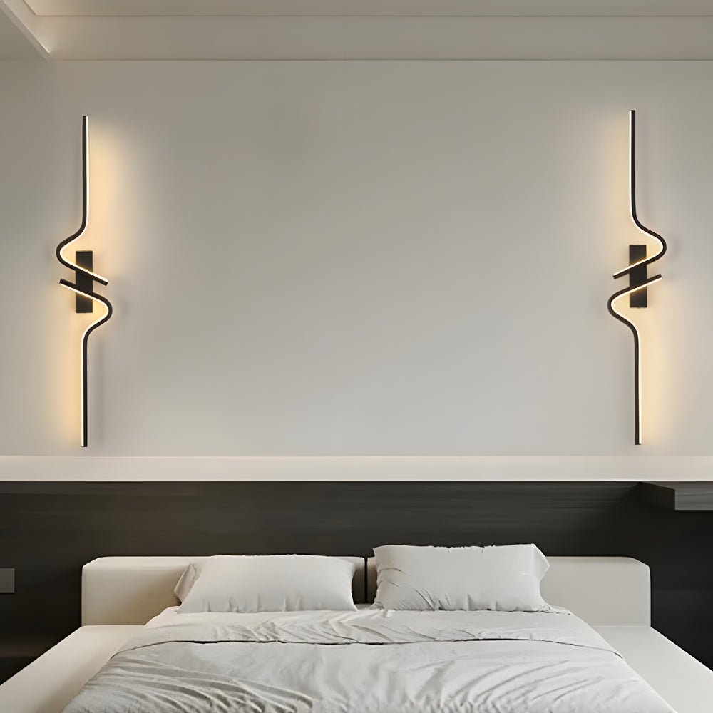 Minimalist modern curved wall sconce with clean lines and ambient lighting, perfect for modern, neutral-toned spaces.