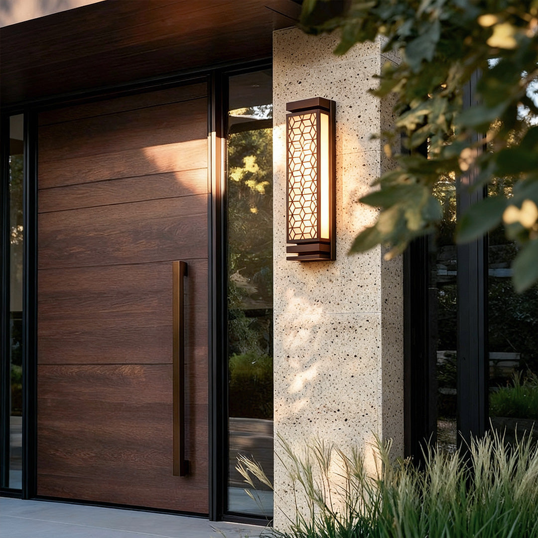 Minimalist square wall sconce light beside a wooden door, enhancing the entrance with subtle and elegant lighting.