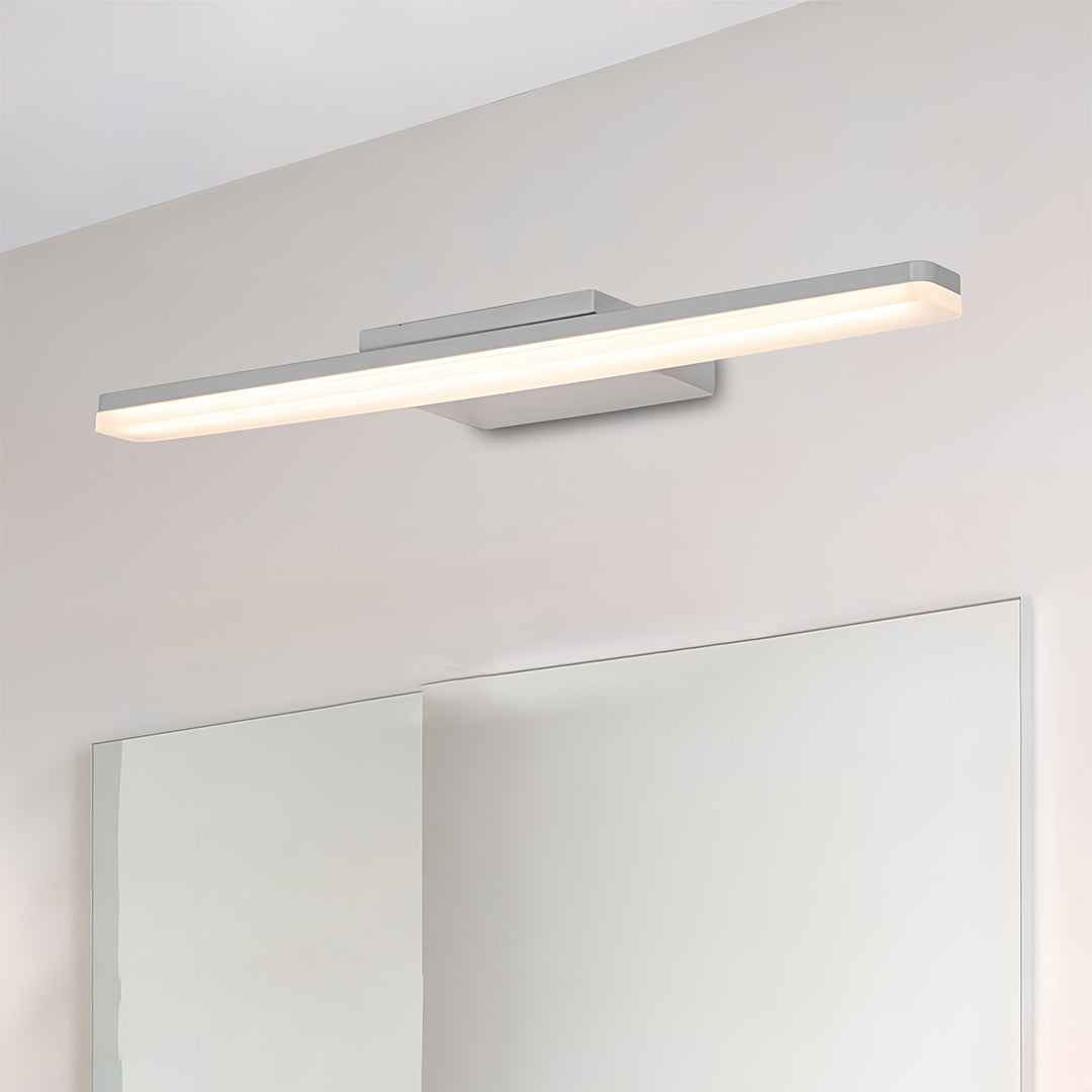 Minimalist bathroom showcasing small black pendant light with modern strip lighting configuration