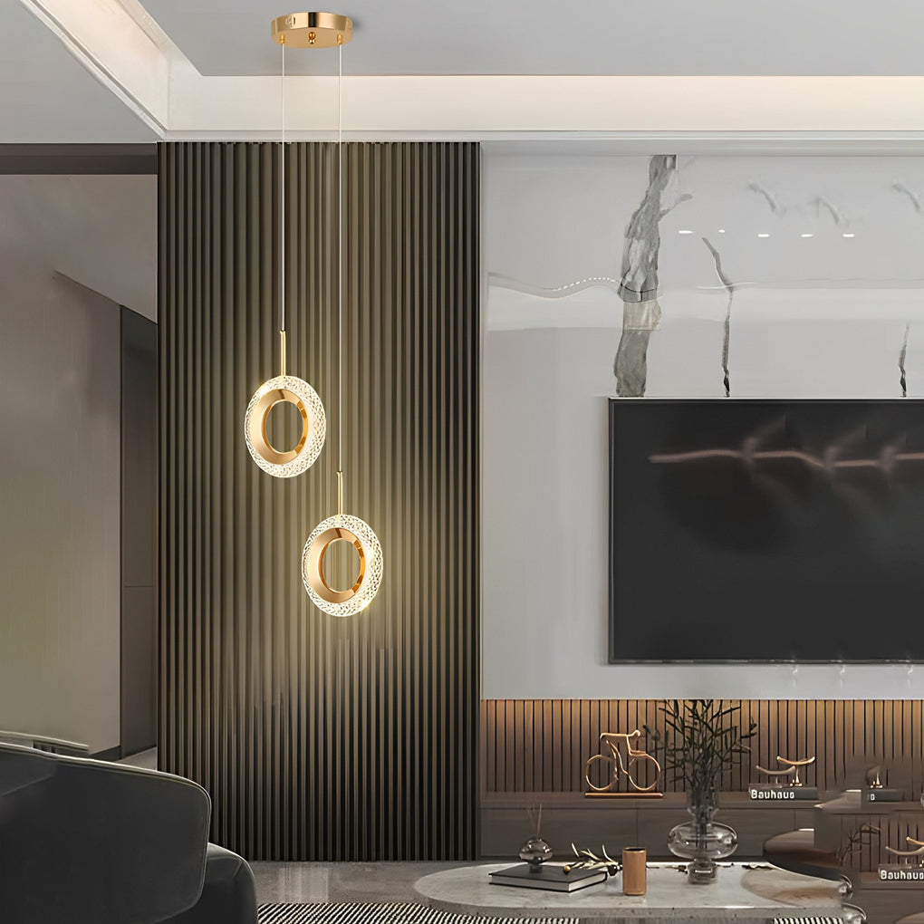 Minimalist unique pendant light hanging above a side table in a modern living space.