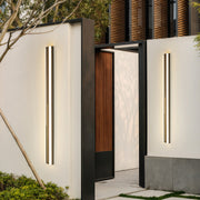 Modern minimalist outdoor wall mount lighting featuring narrow vertical profile with metal accents