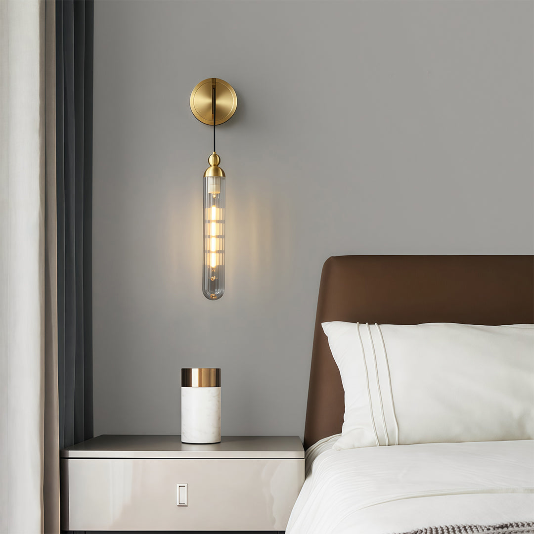 Minimalist wall mount pendant light featuring glass shade chandelier design in brass with textured glass providing soft illumination.