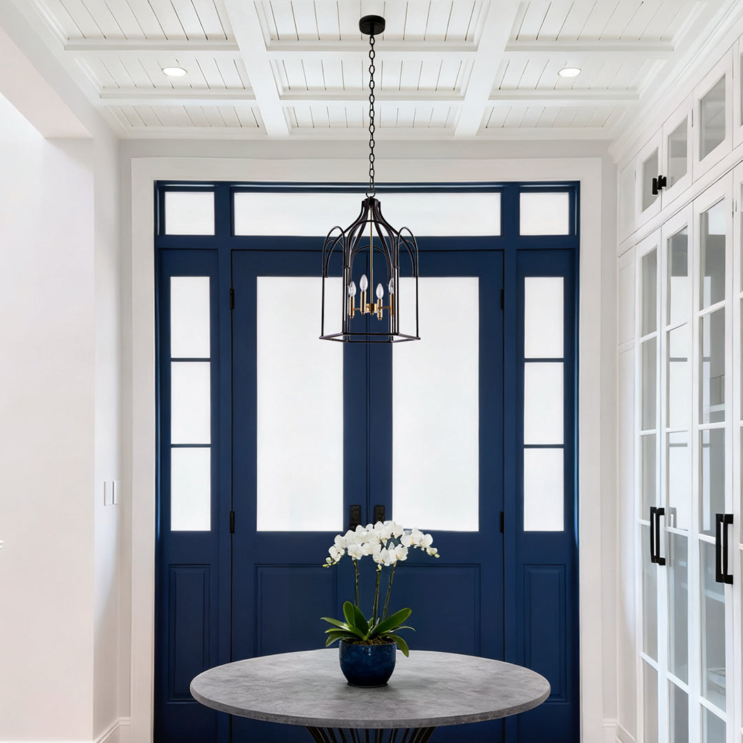 Classic black metal lantern chandelier with candle-style bulbs in a contemporary entryway