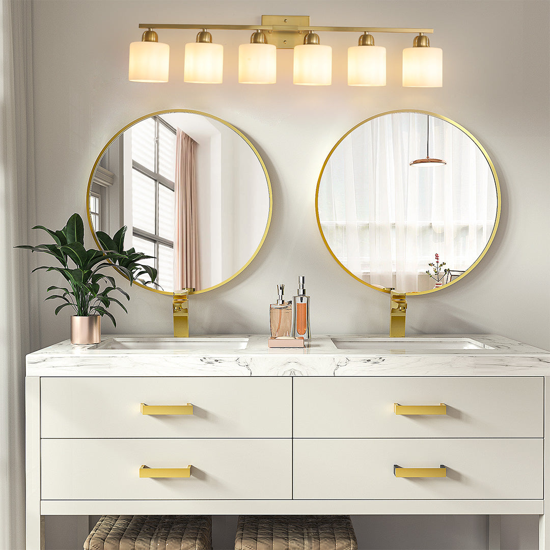 Modern bathroom vanity light with three bulbs, enhancing a minimalist bathroom with a wooden vanity.