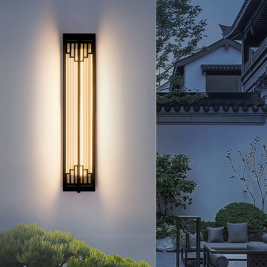 Minimalistic outdoor wall mounted LED lights with a sleek, clean design, mounted on an outdoor wall to brighten up the yard.