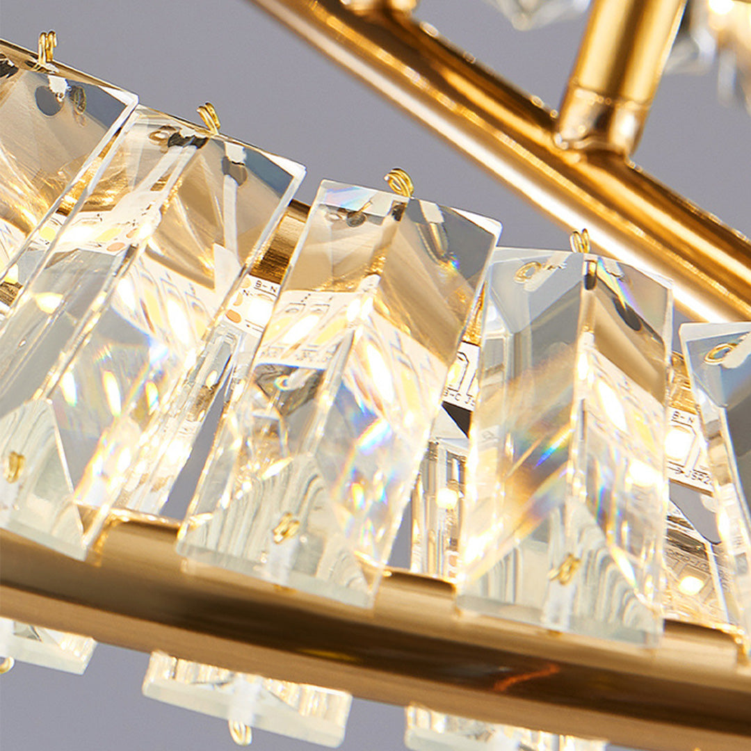 Mobius light fixture installed in contemporary dining room showcasing twisted ring ceiling design