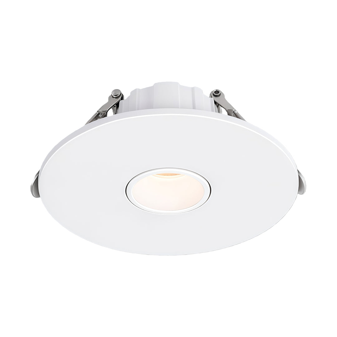 Modern accent spotlight featuring smooth white trim and recessed design for ceiling installations