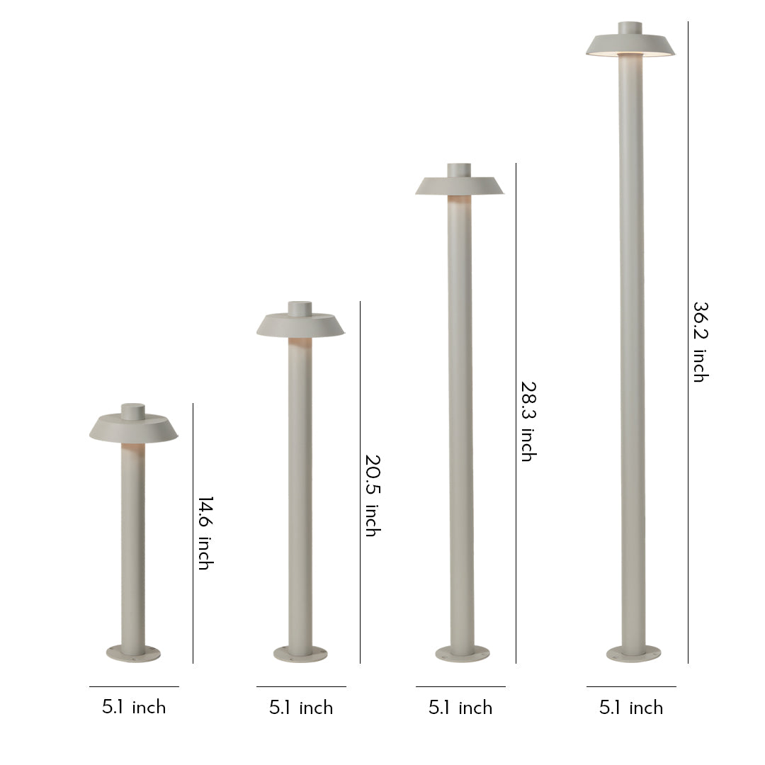 A collection of slim modern aluminum path lights shown in multiple heights against a clean white background.