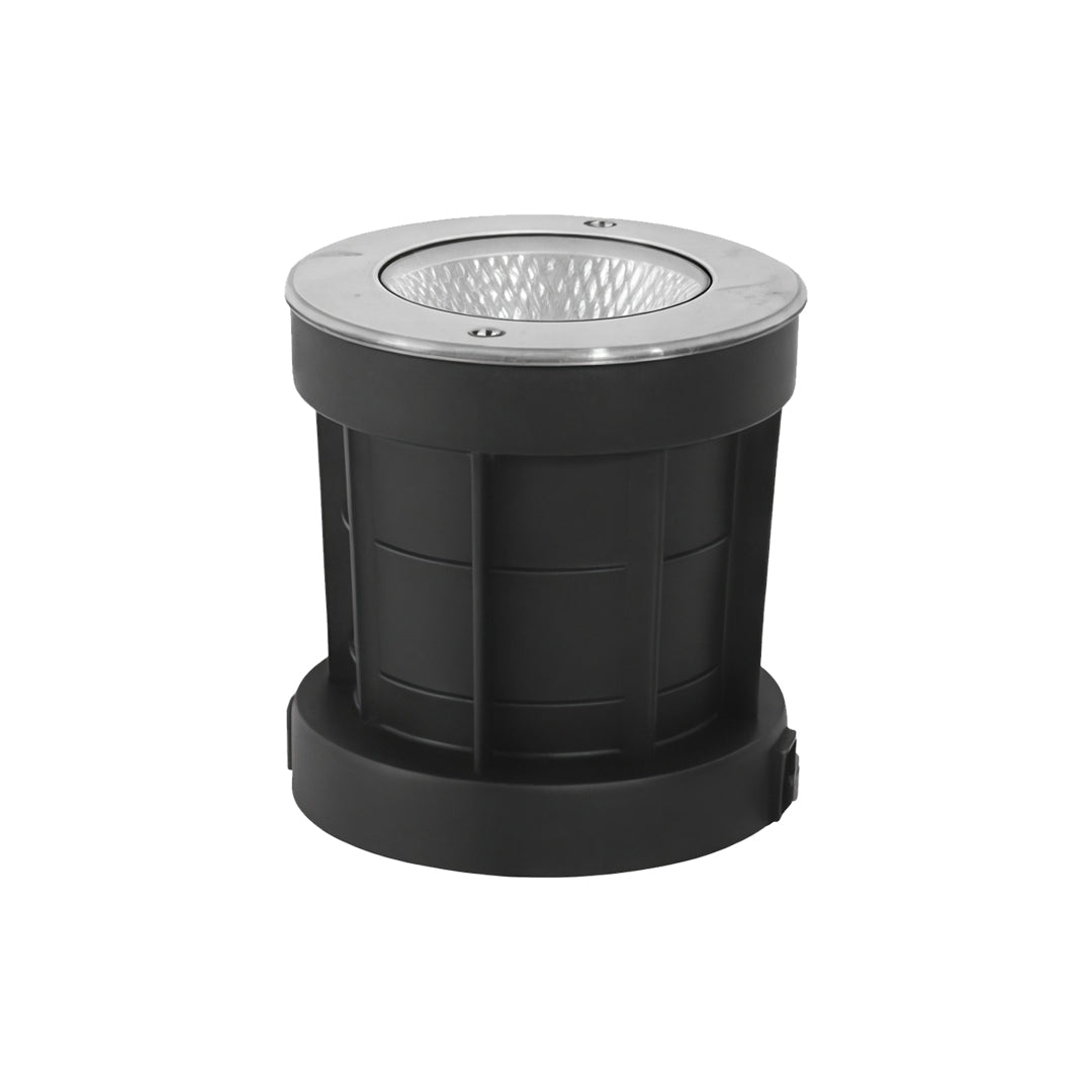 Modern inground light with ribbed body design used for exterior architectural lighting.