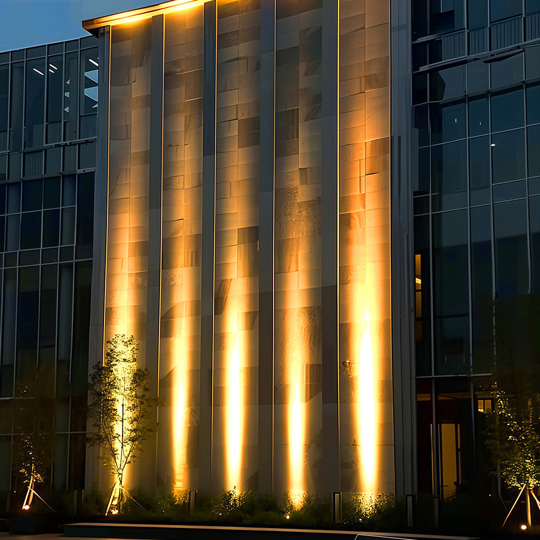 Modern building architecture illuminated by square LED wall wash lights.