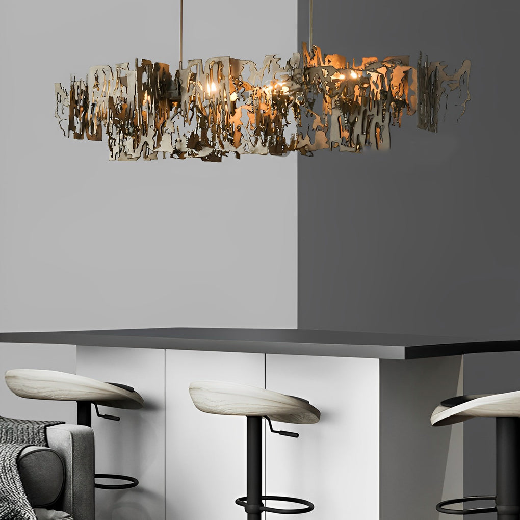 Modern art deco chandelier with a bold design, providing warm light above a modern dining table.