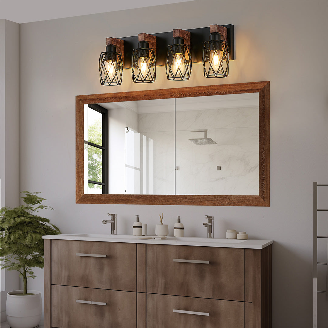 Black vanity bathroom light with four bulbs, providing ample lighting above a modern bathroom mirror.