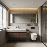 Modern bathroom with inset ceiling spotlights providing soft and even lighting.