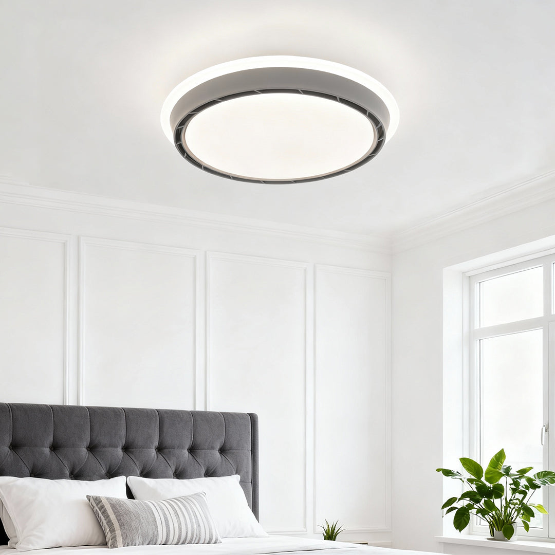 Ceiling light with hidden fan in a modern bedroom, elegant and minimalist indoor fixture