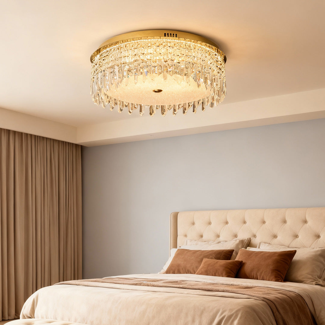 Bedroom with large bed and warm light from crystal ceiling lights flush mount.