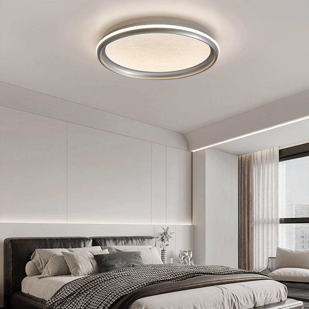 Modern bedroom with metal flush mount light, elegant and functional ceiling lighting