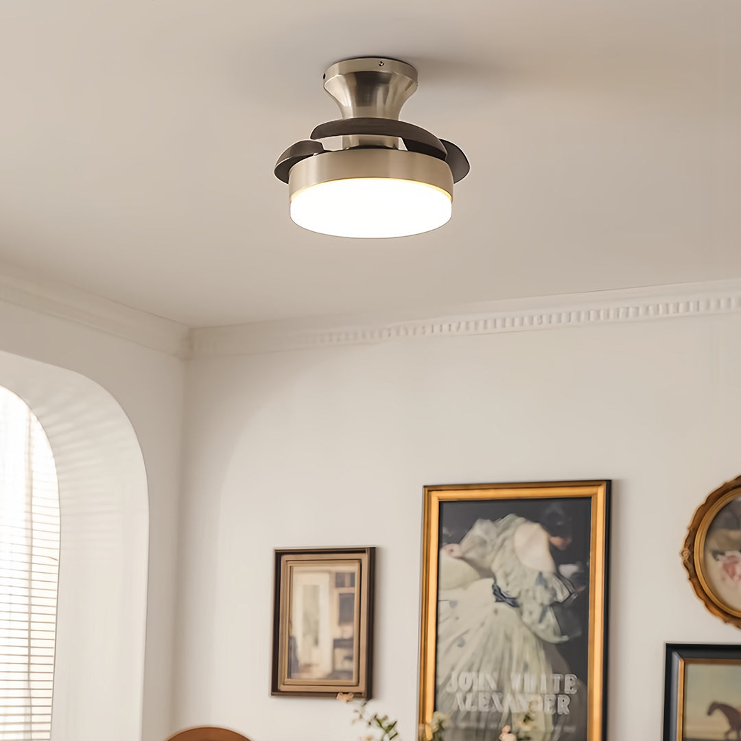 Silver ceiling fan with light in a modern bedroom, elegant and minimalist indoor fixture