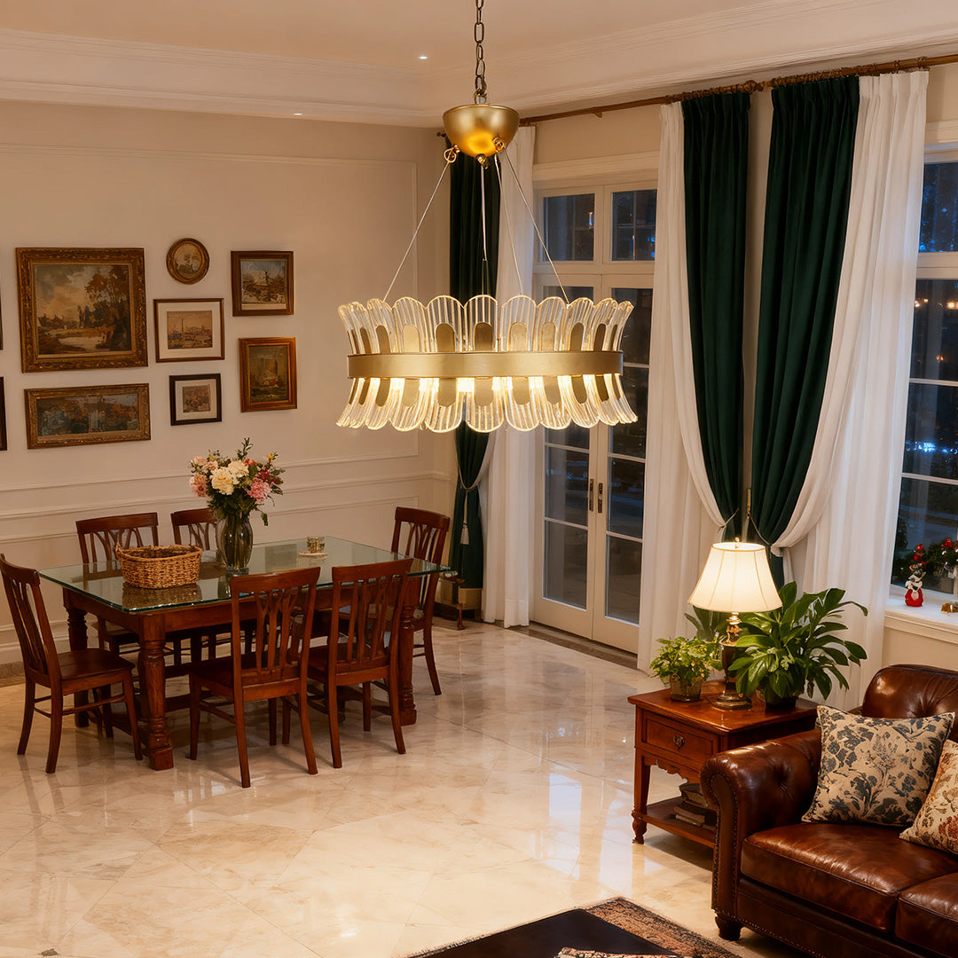 Luxurious gold candle-style chandelier in a traditional dining room with wooden furniture