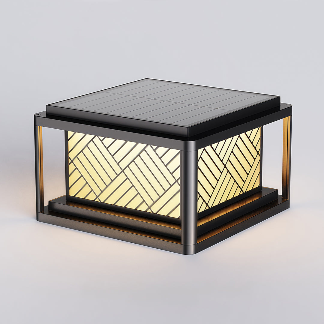 Modern black outdoor pillar LED light with elegant lattice design and warm tone.