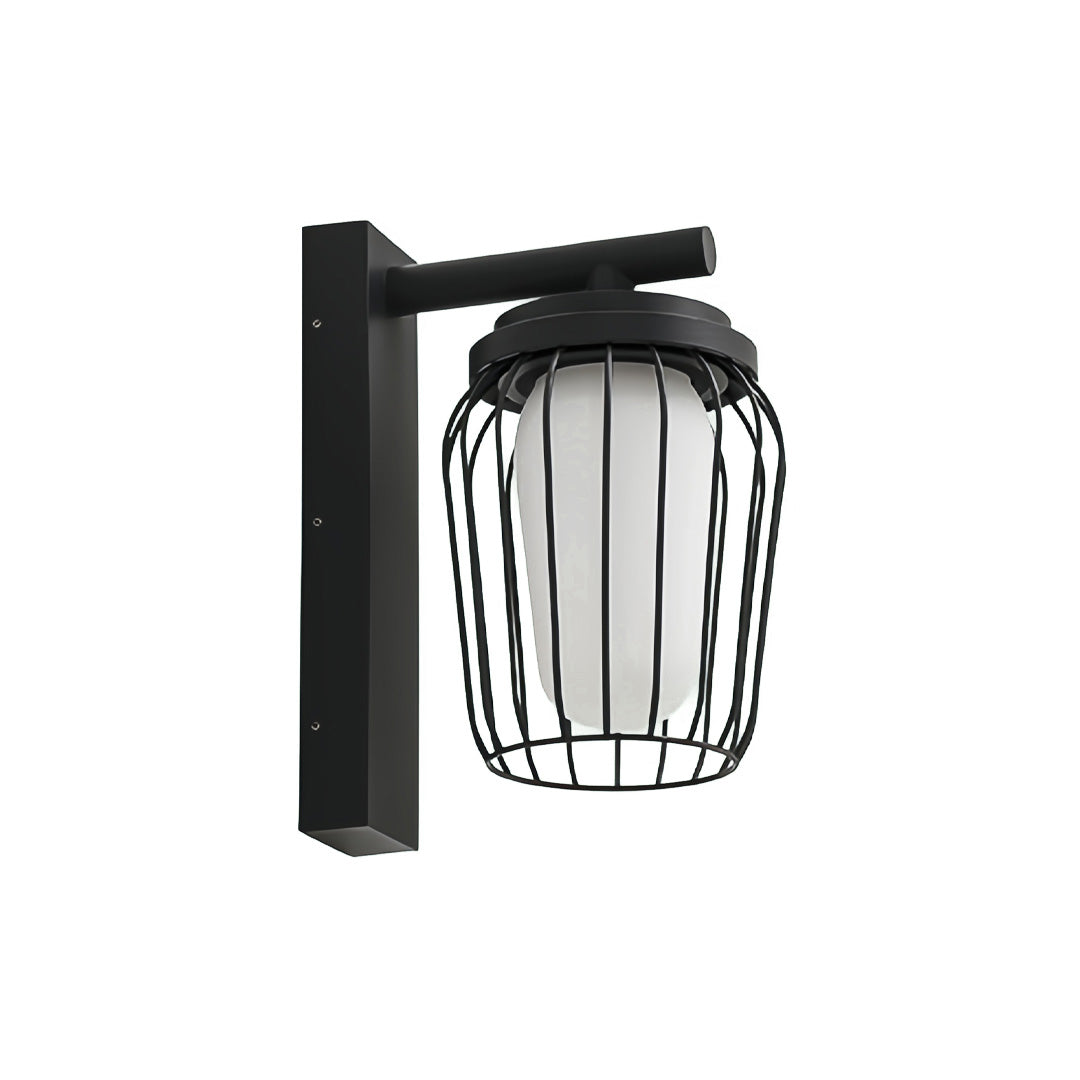 Modern black outdoor wall lantern sconce featuring a clear ribbed glass shade and sturdy rectangular wall arm.