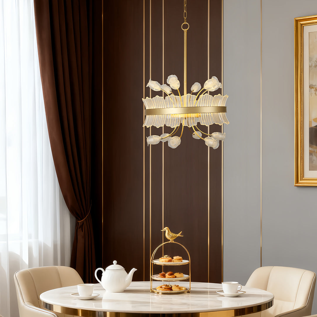 Modern gold blossom chandelier with crystal details in a chic dining room
