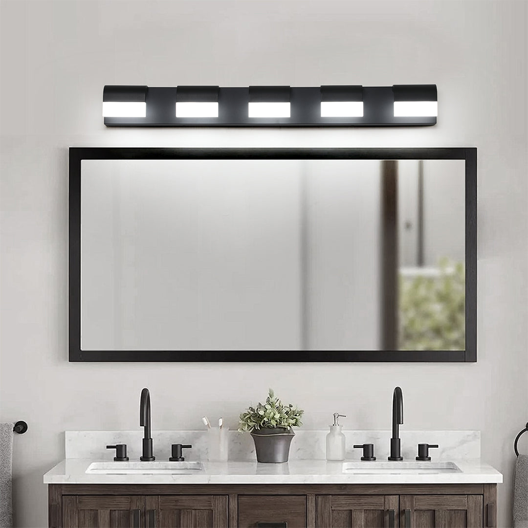 Modern black vanity lighting for bathroom featuring glass shade chandelier design with five-light configuration above mirror.