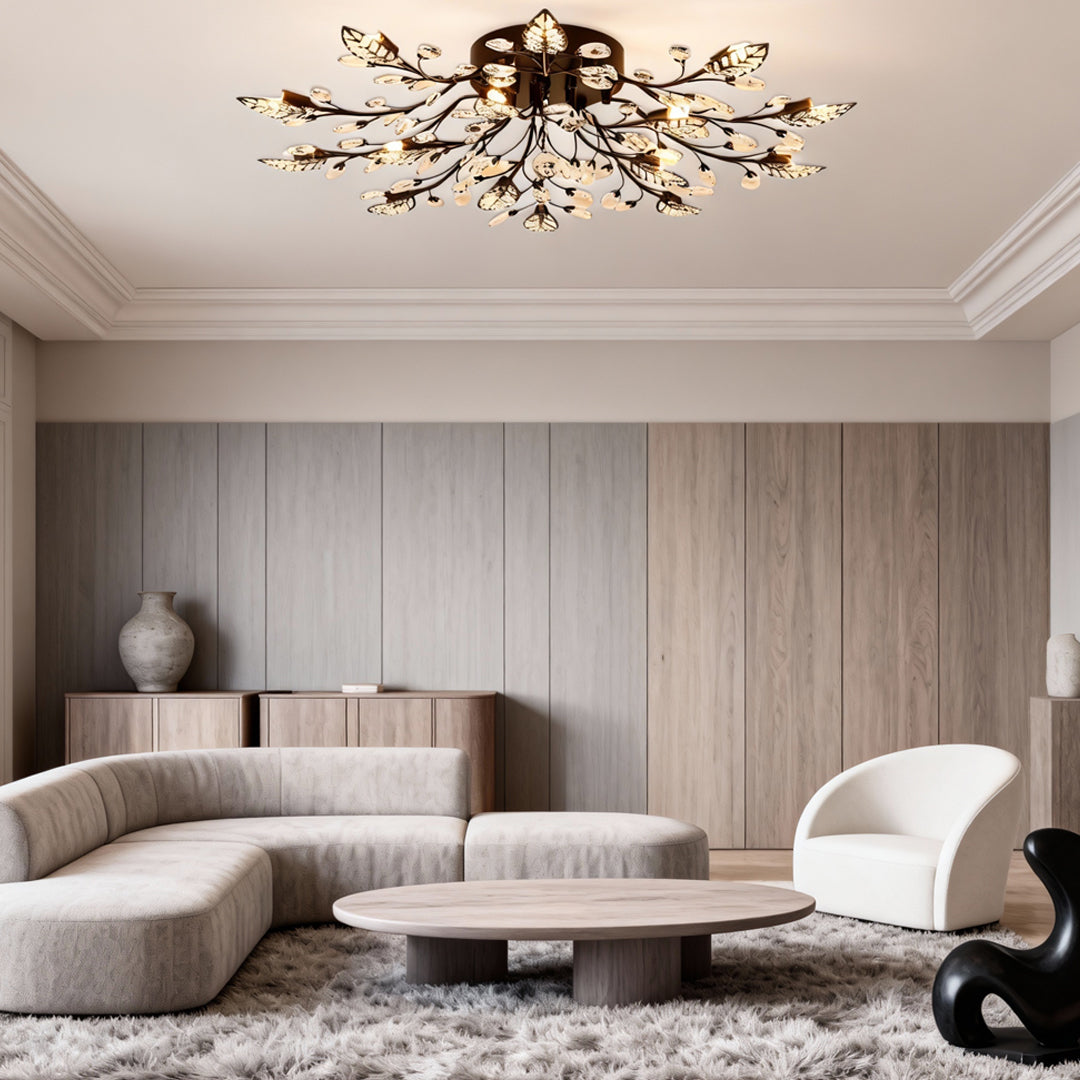 Luxury brass branch chandelier displayed in a minimalist living room with neutral tones.