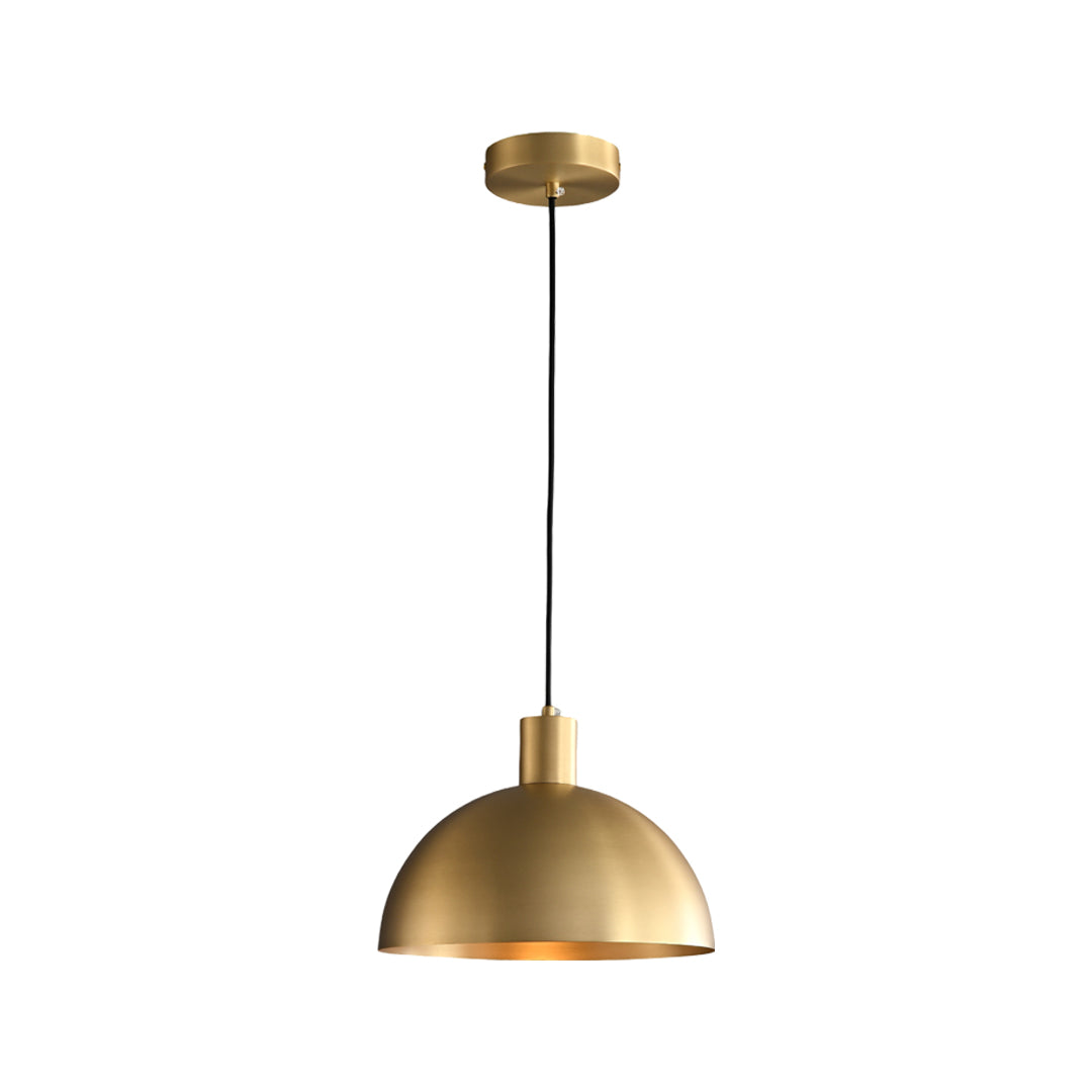 Modern brass pendant lighting fixture with a dome shade and black cable isolated on white background