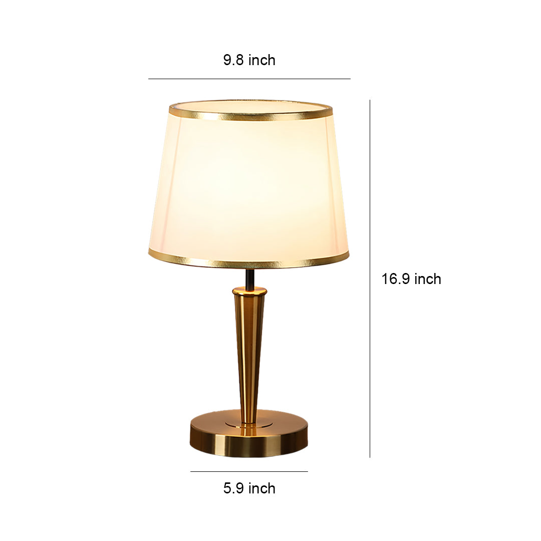 Modern brass table lamp with white fabric shade and technical dimensions displayed