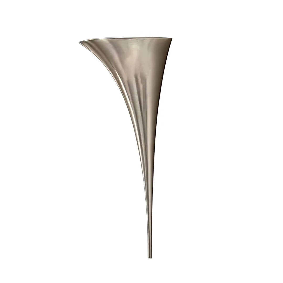 Modern brass wall sconce in a large chrome finish version isolated on a white background.