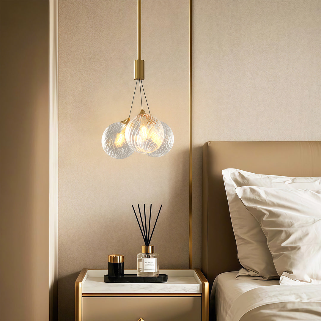 elegant modern bubble chandelier lighting a bright white bedroom