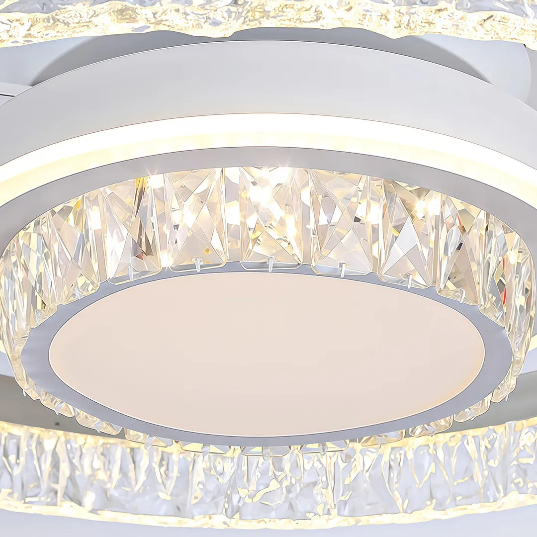 Modern ceiling fan with lights close-up highlighting the layered circular light design and crystal accents.