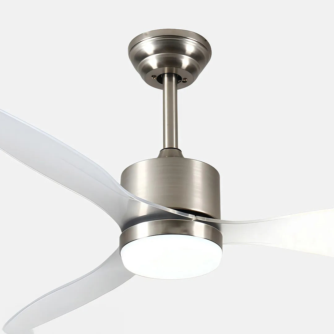 Close-up of modern ceiling fans with LED lights featuring a brushed nickel motor and three white blades.