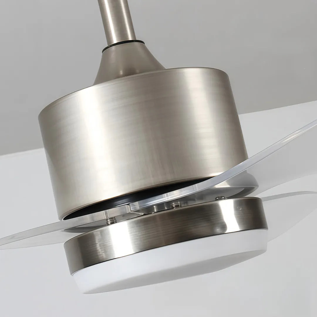 Close-up of modern ceiling fans with LED lights showing the brushed nickel motor housing and integrated LED light.